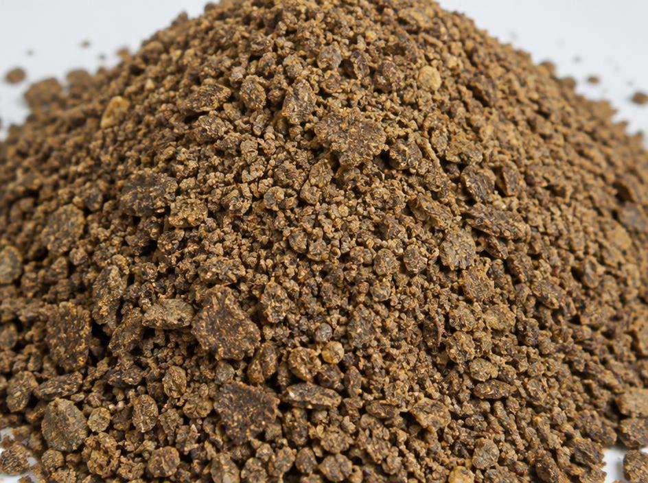 Close-up of coarse brown rapeseed meal